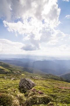 Sunlight falling on mountain hill landscape photo Stock Photos