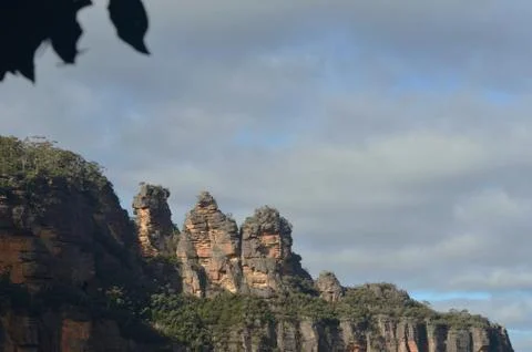 Sunlight falling on the Three Sisters in the Blue Mountains, Australia. Stock Photos