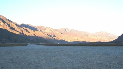 Sunlight falls on the rocky mountains of Altai. Sunset Stock Footage 265016763