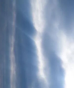 Sunlight filtering through the clouds Stock Photos
