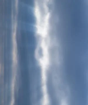 Sunlight filtering through the clouds Stock Photos