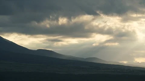 Sunlight filtering through dramatic sunset clouds, lake Yamanaka, Yamanashi Video stock 249639617