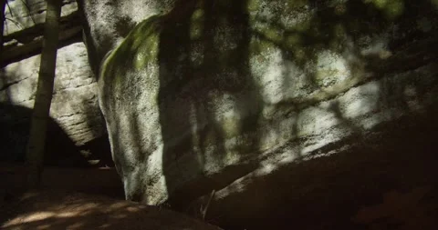 Sunlight Filtering Through Trees Onto Sandstone Rocks In Bohemian Paradise 库存影片 345056583