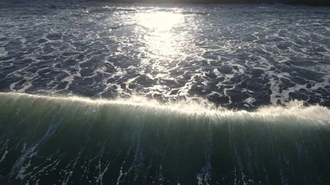 Sunlight glaring on the ocean waves as they break. Stock Footage 162082506