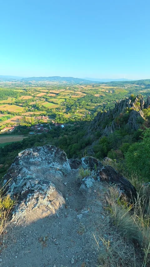 Sunlight gleams over ancient stone ridges. Boracki krs Serbia Vertical 動画素材 345005983