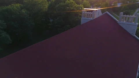 Sunlight Glimmering on Rooftop Above Cathedral of the Ozarks Stock Footage 328853622