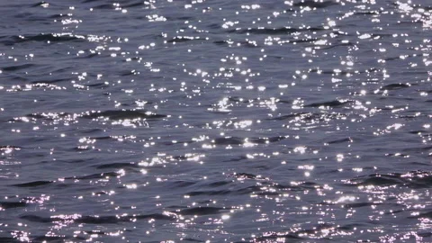 Sunlight Glitters in Ocean Waves Stock Footage 161087279