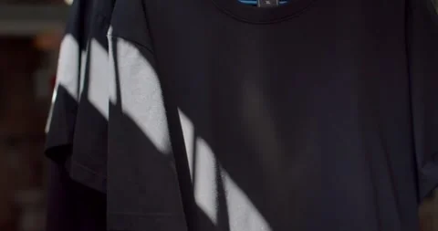 The sunlight hits the clothes 3 Stock Footage 251292840