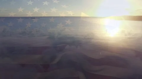 Sunlight hitting calm water causing reflection shimmering while flag overlay Stock Footage 334694142