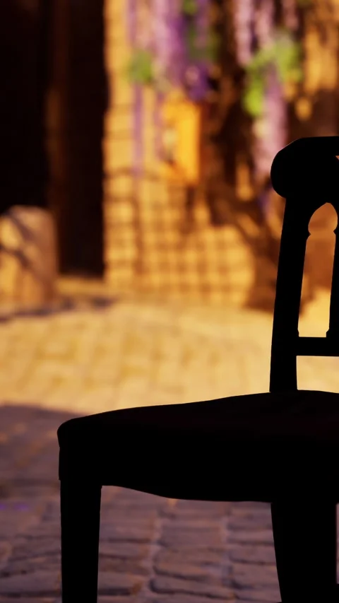 Sunlight hitting a chair in a courtyard during late afternoon hours Stock Footage 340870857