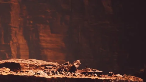Sunlight hitting rock formations in a canyon during the afternoon Stock Footage 340628571