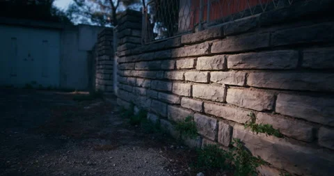 Sunlight hitting stone wall in residential area in Sibenik Croatia Video stock 336140938