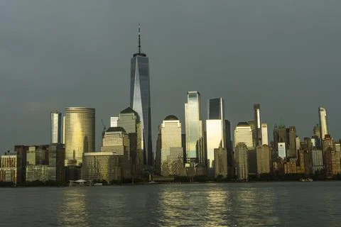 The sunlight illuminates the Lower Manhattan skyscraper NYC Stock Photos