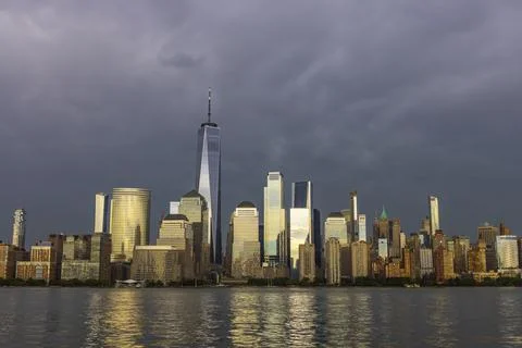 The sunlight illuminates the Lower Manhattan skyscraper NYC Stock Photos