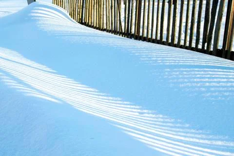 Sunlight lines on snow Stock Photos