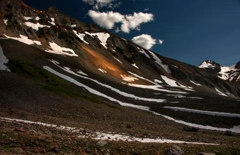 Sunlight on Mountain Above Timberline Stock Photos