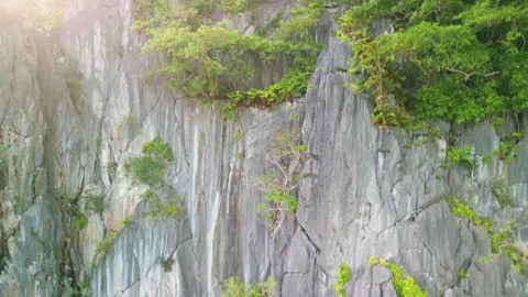 Sunlight Over Limestone Cliffs and Forest – El Nido Palawan Stock Footage 320946900