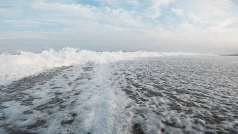 Sunlight Over The White Foam Of Ocean Waves Stock Footage 284236158