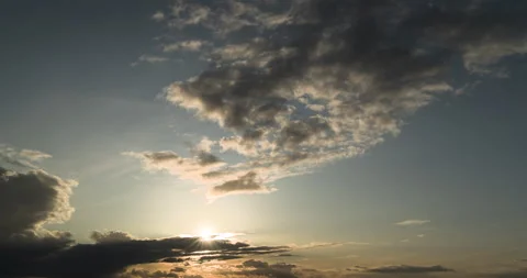 Sunlight passing through clouds during sunset until dusk. Timelapse, part 1 Stock Footage 253513241