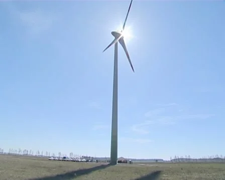 Sunlight penetrating through rotating windmill wings. Stock Footage 8984896