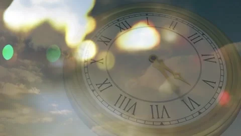 Sunlight piercing clouds creating flares as Roman clock hand advancing to hour Stock Footage 318194256