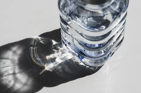 Sunlight on plastic bottle of water Stock Photos
