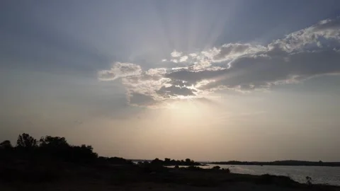 Sunlight Rays Across Calm Lake Stock Footage 335801998