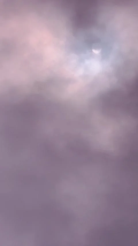 Sunlight Rays Emerging Through Thick Clouds in Dramatic Sky. Stock Footage 336680295