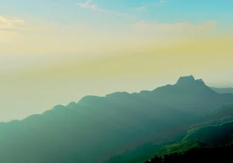 Sunlight rays through park of the mountain Stock Photos