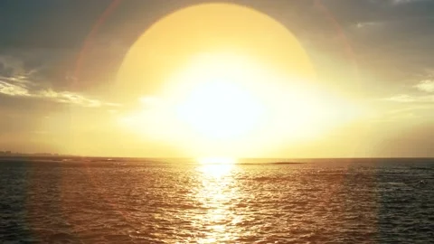 Sunlight Reflect on water and Light Flare Circle Radiant over the Sea Stock Footage 153590000