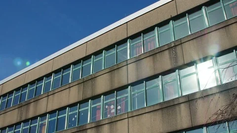 Sunlight reflected on office building Stock Footage 74225331