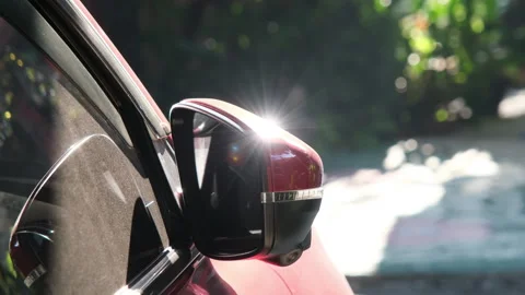 Sunlight reflected on the side mirror of a parked car. Stock Footage 260861582
