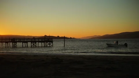 Sunlight reflected on the water at the beach at sunset. Stock Footage 88405686