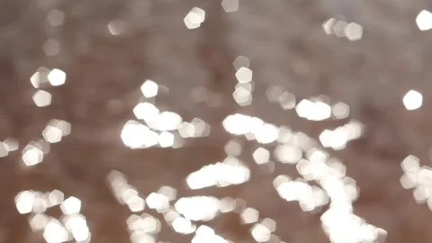 Sunlight reflected in the water. Defocused glare on the surface of the water. Video stock 196746550