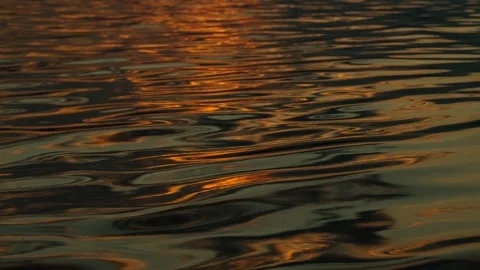 Sunlight is reflected in the waves of the lake, sea, ocean. The water surface. Stock Footage 317253056
