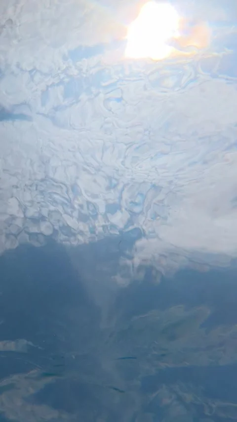 Sunlight reflecting and rippling across ocean surface from underwater Stock Footage 342161666