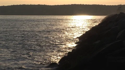 Sunlight reflecting on Atlantic Ocean in Gloucester harbor, Massachusetts USA Stock Footage 101927279