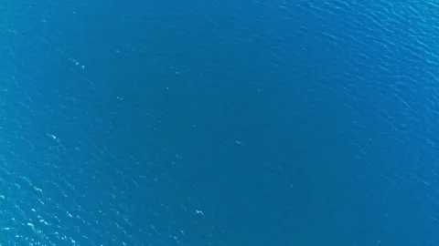 Sunlight reflecting on moving water surface Stock Footage 282604579