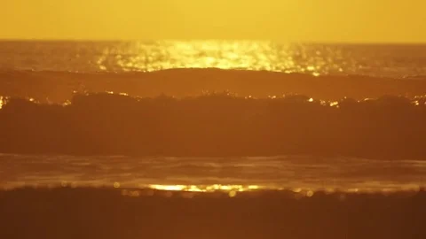 Sunlight Reflecting On Rushing Sea Waves During Sunset Stock Footage 79655179