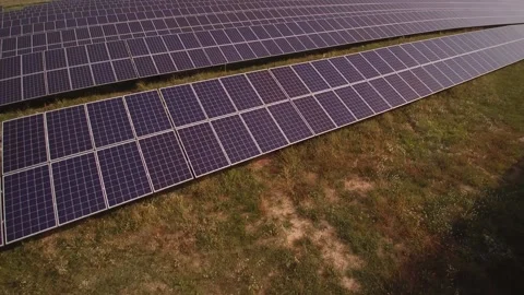 Sunlight reflecting in solar panels at electrical station 스톡 동영상 169855521