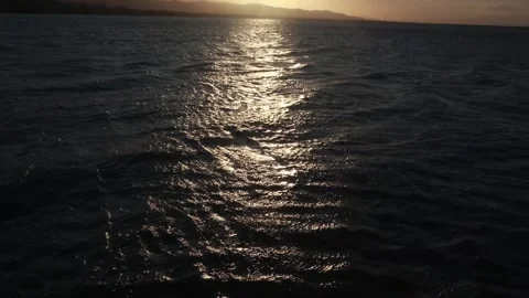 Sunlight Reflecting on Sparkling Lake Surface Video stock 289307200