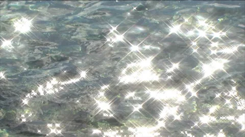 Sunlight reflecting on the water Stock Footage 32511338