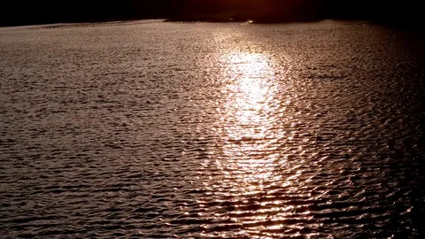 Sunlight Reflection in Water in the sunset, Sea waves with sun setting down Video stock 87959889