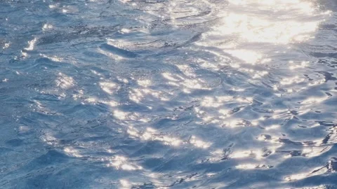 Sunlight Reflections on Rippling Water Stock Footage 282932533