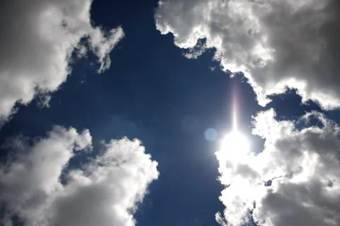 Sunlight reflex on clouds Stock Photos