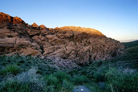 Sunlight on Rock Peak at Sunset Stock Photos
