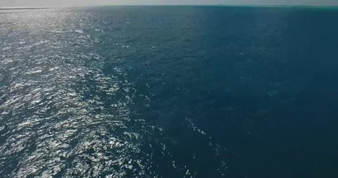 Sunlight shimmering off the ocean water Stock Footage 155456757