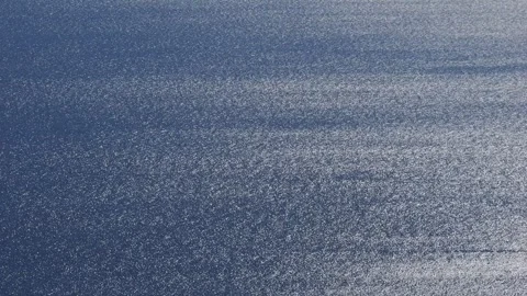 Sunlight Shimmering On Wind Ripples Across Aegean Sea Surface 库存影片 330802855