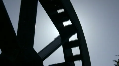 Sunlight shines through gaps of spinning water wheel (High Definition) Video stock 365059