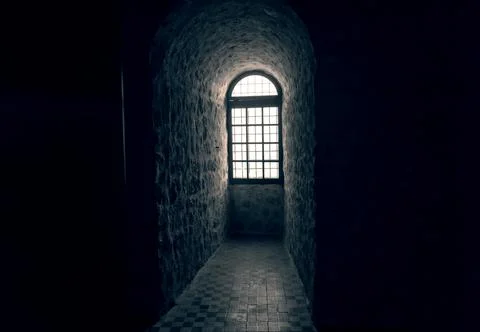 Sunlight shines through a window in an old castle Stock Photos